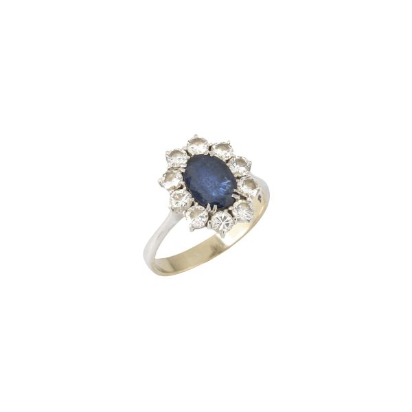



DAISY RING WITH SAPPHIRE AND DIAMONDS