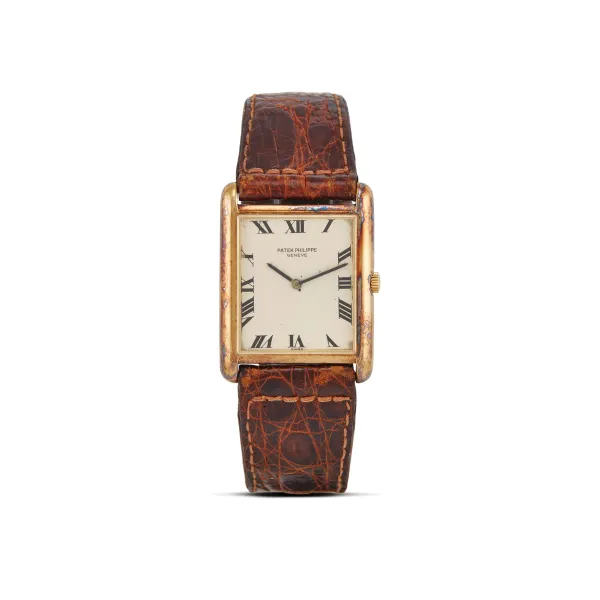 Patek Philippe - 



PATEK PHILIPPE TANK REF. 3521 YELLOW GOLD WRISTWATCH