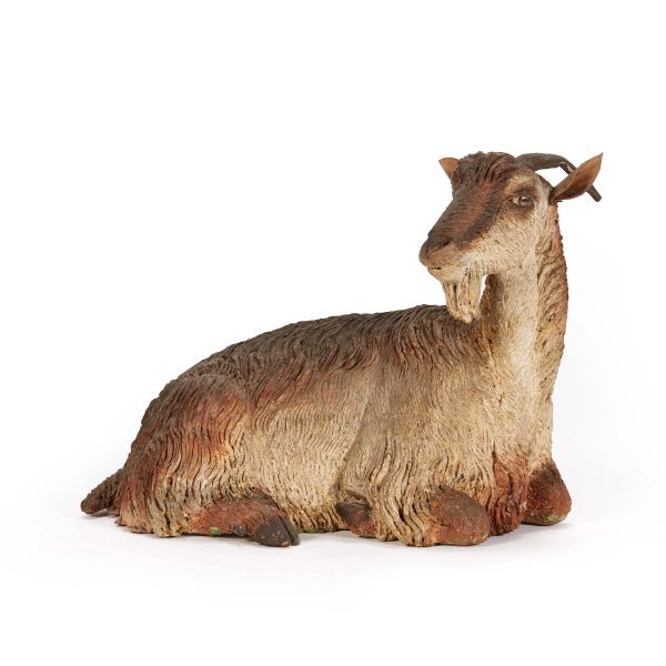 A CROUCHING GOAT, NAPLES, 18TH/19TH CENTURY