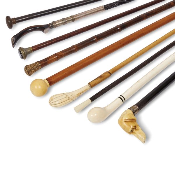 A GROUP OF NINE WALKING STICKS AND UMBRELLAS, 19TH AND 20TH CENTURIES
