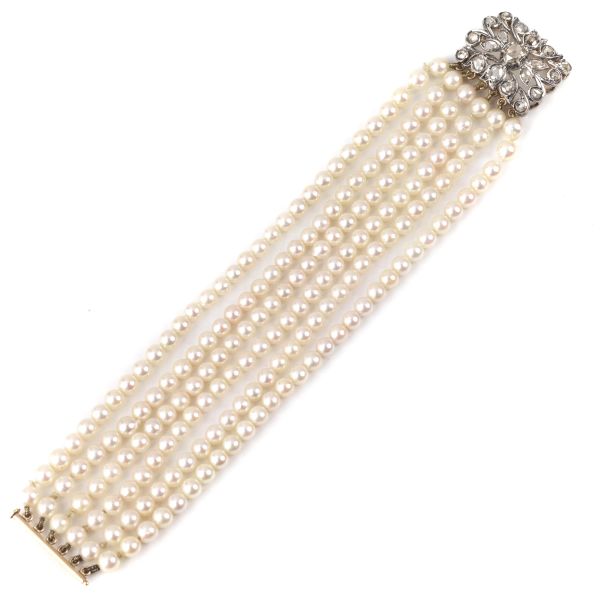 PEARL BRACELET IN GOLD AND SILVER