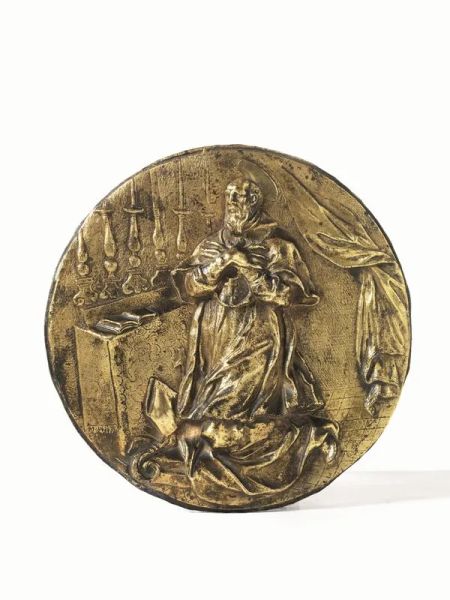  Placca, Roma, fine sec. XVII,  in bronzo dorato raffigurante Santo Vescovo, diam. cm 21