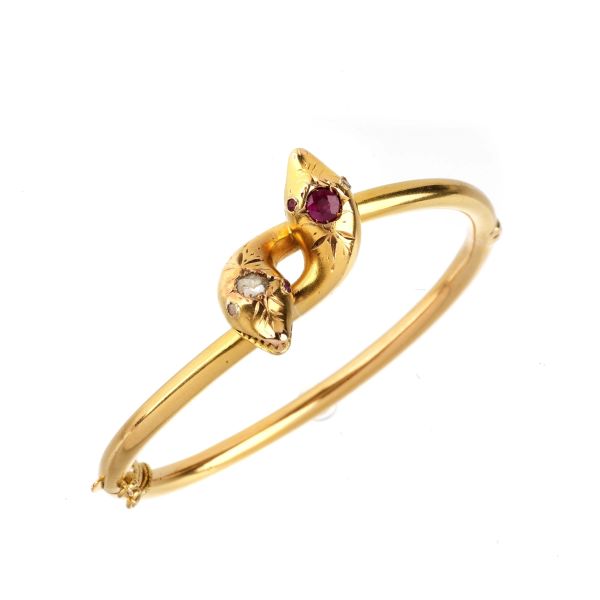 CONTRARIE BANGLE BRACELET IN 18KT YELLOW GOLD