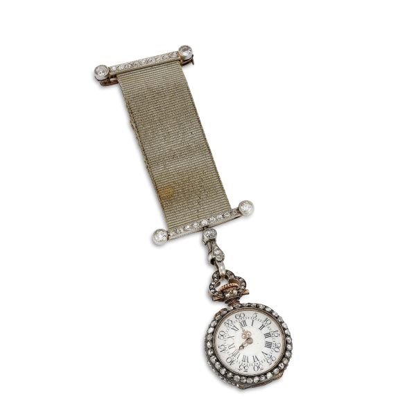 GOLD AND PLATINUM BROOCH WITH A SMALL SILVER POCKET WATCH
