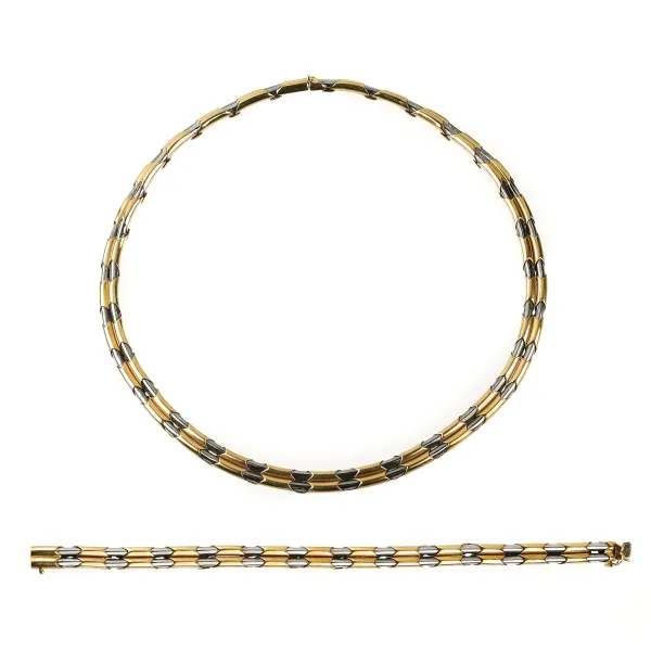 Chimento - 



CHIMENTO DEMI PARURE IN 18KT YELLOW GOLD AND STEEL