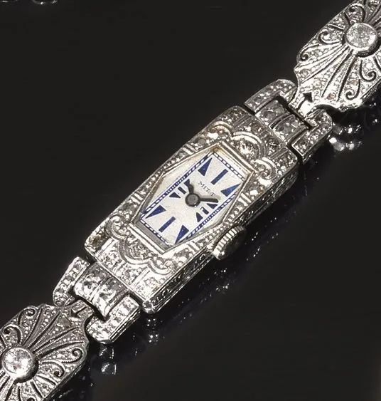 Bracciale - orologio, Mitot, 1910 circa, in platino e diamanti,