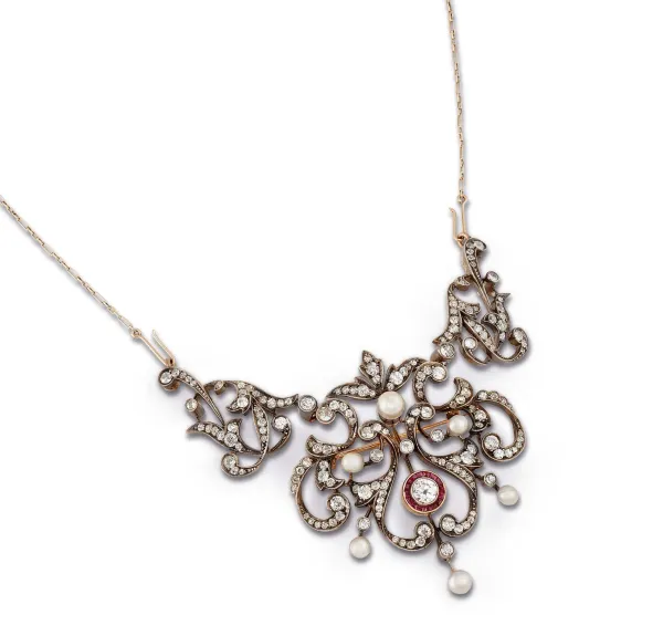 



PEARL AND DIAMOND PENDANT/BROOCH IN GOLD AND SILVER 