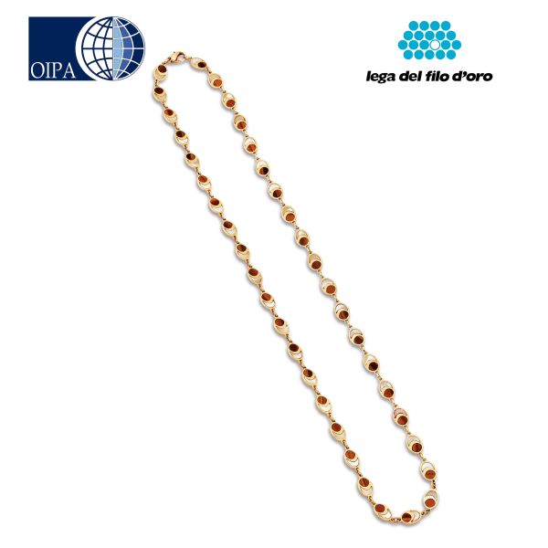 Bulgari - 



BULGARI LONG TIGER EYE AND MOTHER OF PEARL NECKLACE IN 18KT YELLOW GOLD 