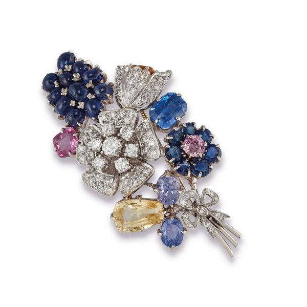 



FLOWER-SHAPED BROOCH WITH SAPPHIRES