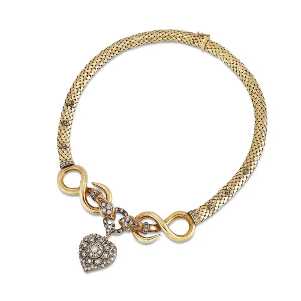 DIAMOND SNAKE-SHAPED NECKLACE IN 18KT YELLOW GOLD AND SILVER