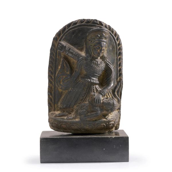 



A NEPALESE STONE STELE OF A PROTECTIVE DEITY, 17TH CENTURY 