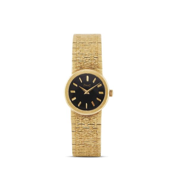 Piaget - 



PIAGET ORO GIALLO REF. 9711 A6