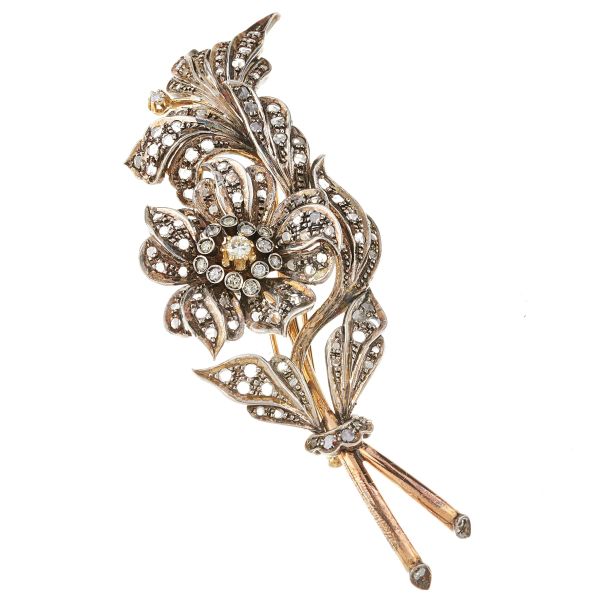 



FLOWERING BRANCH-SHAPED DIAMOND BROOCH IN GOLD AND SILVER