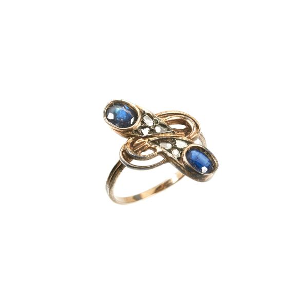 SAPPHIRE AND DIAMOND RING IN 12 KT GOLD