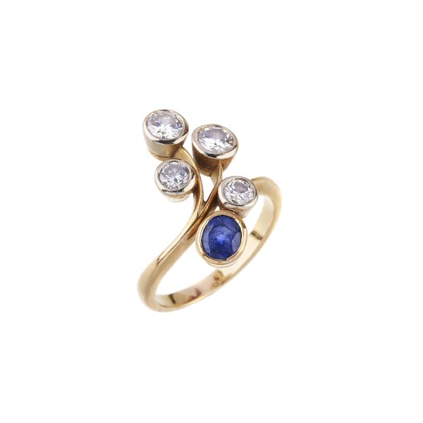 



SAPPHIRE AND DIAMOND RING IN 18KT YELLOW GOLD