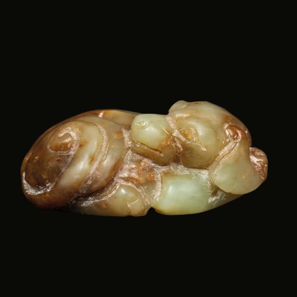 



A CELADON JADE CARVING OF A DOG, CHINA, QING DYNASTY, 19TH CENTURY