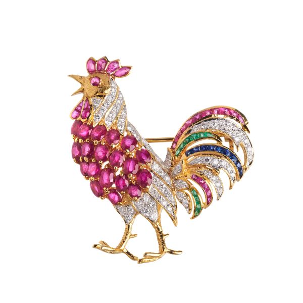 



MULTI GEM ROOSER-SHAPED BROOCH IN 18KT YELLOW GOLD