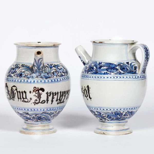 A PAIR OF SPOUTED PHARMACY JARS, SAVONA OR ALBISOLA, EARLY 18TH CENTURY