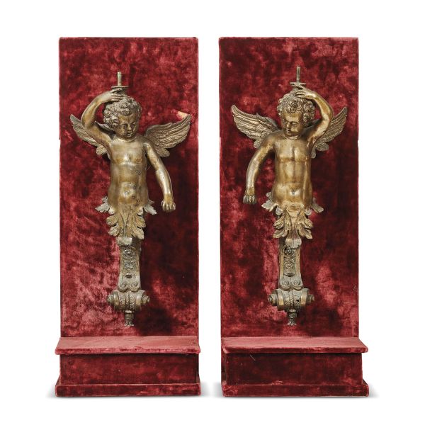 Venetian, second half 17th century, A couple of winged putti, patinated bronze, 55x25x16 cm (each) on base 76x30,5x19 cm