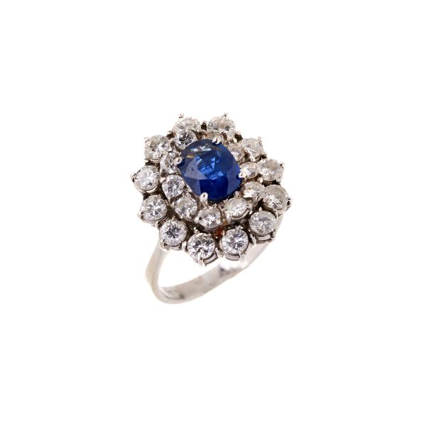 ANELLO A MARGHERITA CON ZAFFIRO E DIAMANTI