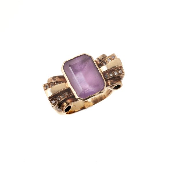 



ANELLO A FIOCCO CON AMETISTA 