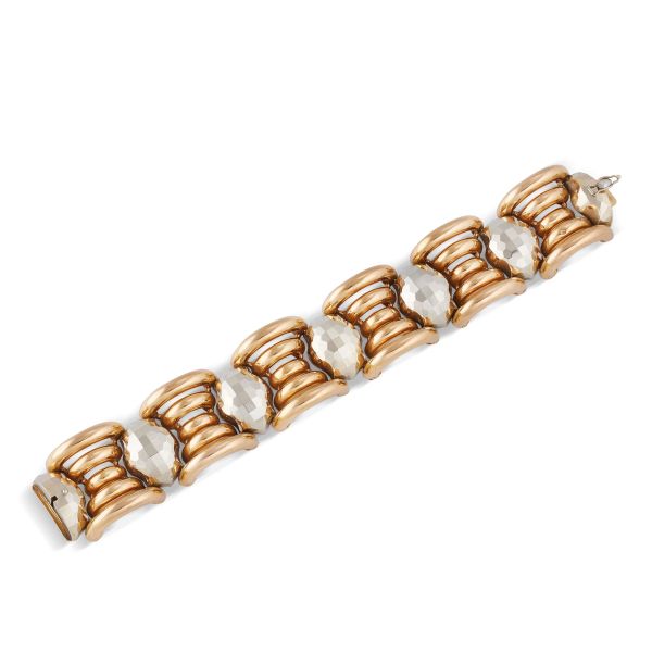 



WIDE BAND BRACELET IN 18KT TWO TONE GOLD