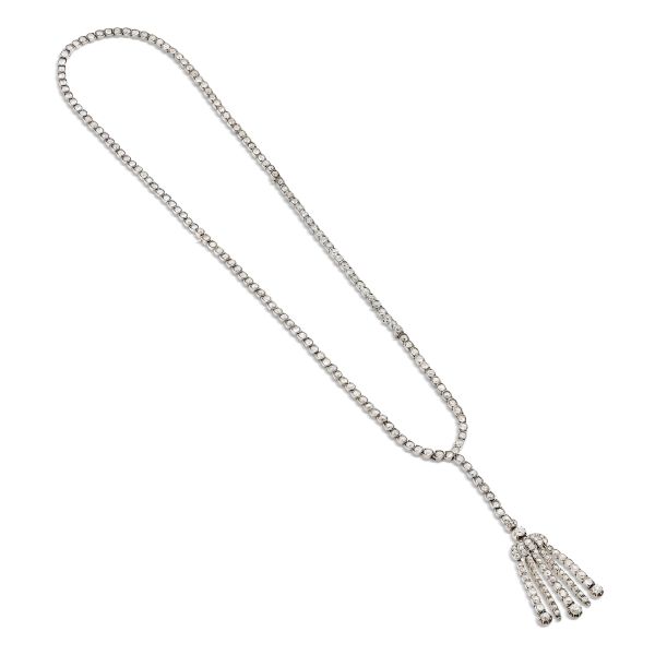 



LONG DIAMOND NECKLACE WITH A FRINGE PENDANT IN SILVER AND GOLD 