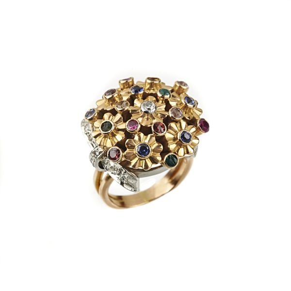 



ANELLO FLOREALE CON PIETRE DI COLORE E DIAMANTI
