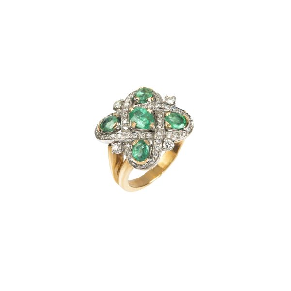 



RING WITH EMERALDS AND DIAMONDS