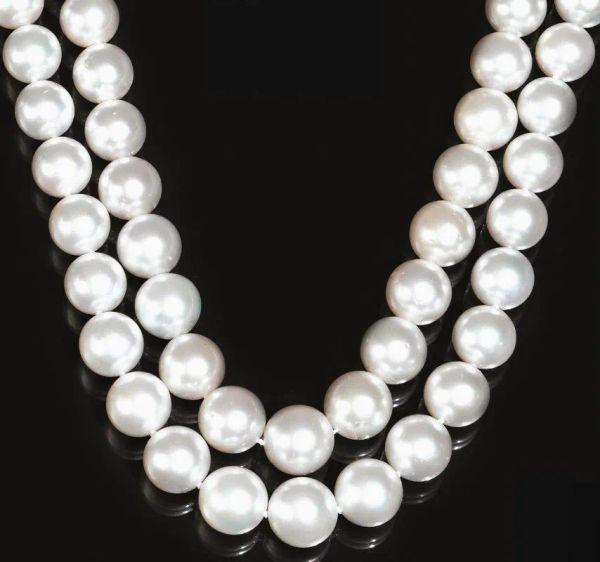 Collana in perle australiane, oro bianco e diamanti