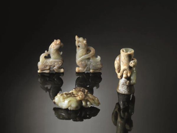  Tre intagli, Cina sec. XIX - XX,  in giada, due, sagomati nella forma di    