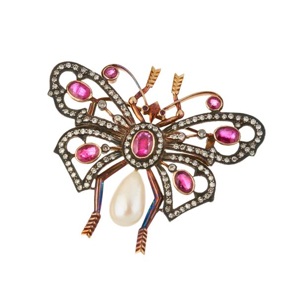 



RUBY AND DIAMOND BUTTERFLY-SHAPED BROOCH IN GOLD AND SILVER 