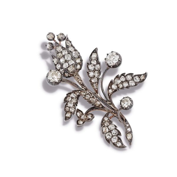 



FLORAL DIAMOND BROOCH IN SILVER AND 9KT YELLOW GOLD