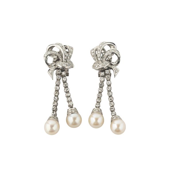 



DIAMOND AND PEARL DROP EARRINGS IN 18KT WHITE GOLD AND PLATINUM