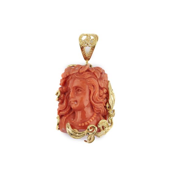 



CARVED CORAL PENDANT IN 18KT YELLOW GOLD