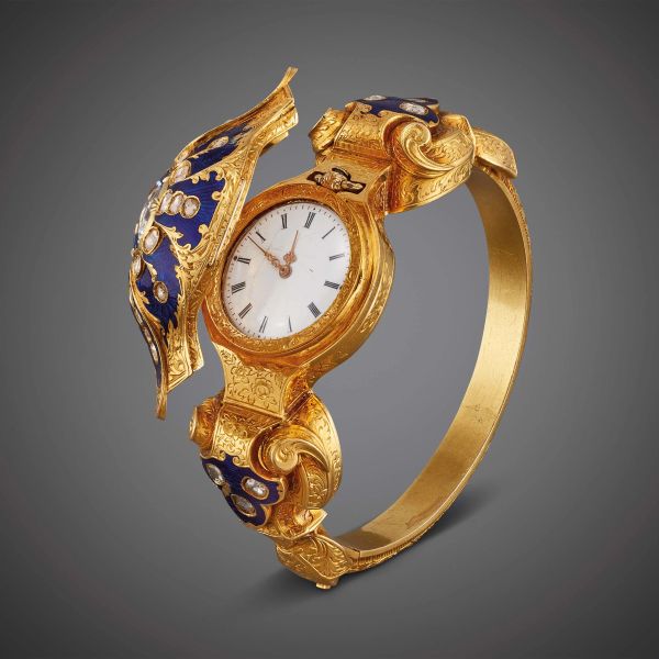 BRACCIALE RIGIDO CON OROLOGIO A SCOMPARSA