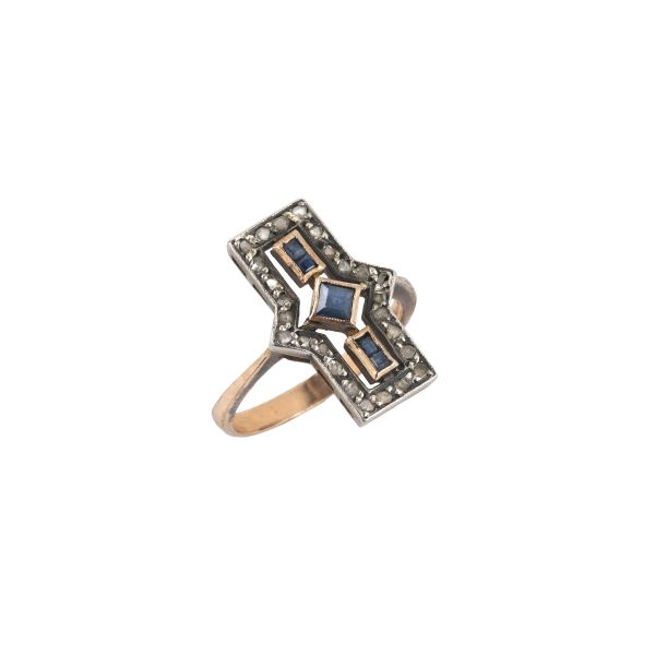 



ANELLO CON PIETRE SINTETICHE E DIAMANTI