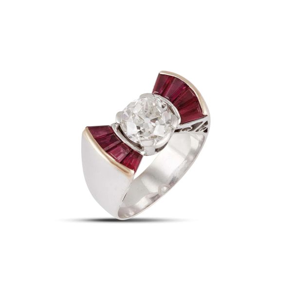 



ANELLO CON DIAMANTE E RUBINI