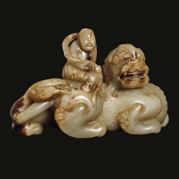 A WHITE JADE GREEN WITH RED IRON CARVING , CHINA, MING DYNASTY, 17TH CENTURY