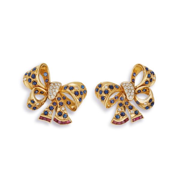 



MORONI BOW EARRINGS WITH DIAMONDS AND SAPPHIRES IN 18KT YELLOW GOLD