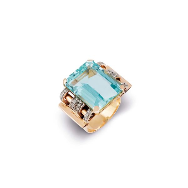 



AQUAMARINE AND DIAMOND BAND RING IN 18KT TWO TONE GOLD