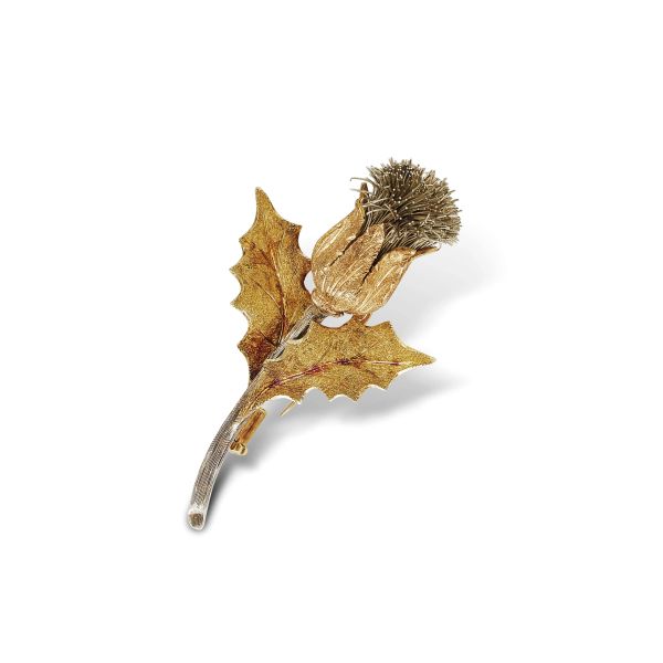 Buccellati - 



BUCCELLATI THISTLE BROOCH IN 18KT YELLOW GOLD AND SILVER 