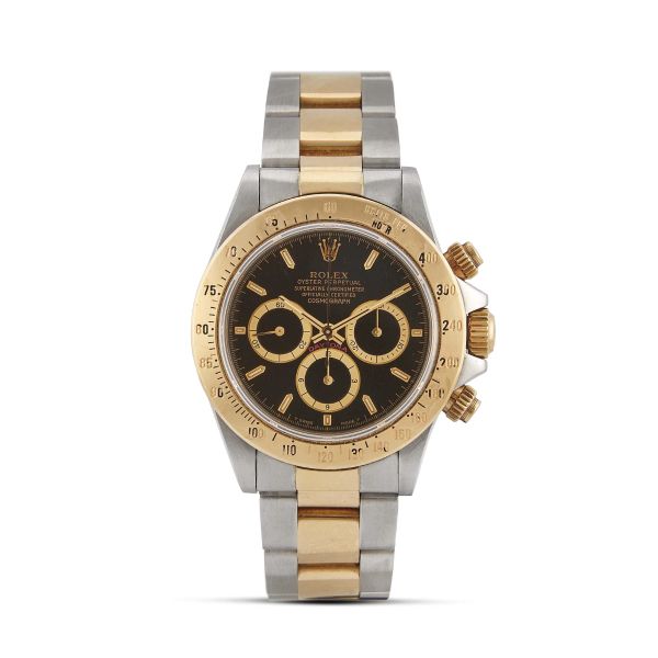 Rolex - ROLEX DAYTONA REF. 16523 "INVERTED SIX" N. E4914XX YELLOW GOLD AND STAINLESS STEEL WRISTWATCH, 1991