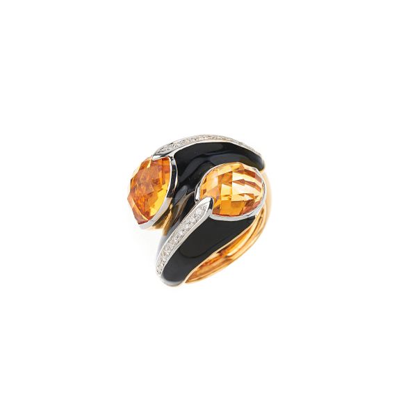 



CITRINE QUARTZ AND DIAMOND CONTRARIE RING IN 18KT YELLOW GOLD