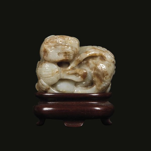 A JADE CARVING WITH RED IRON, CHINA, QING DYNASTY, 15TH CENTURY