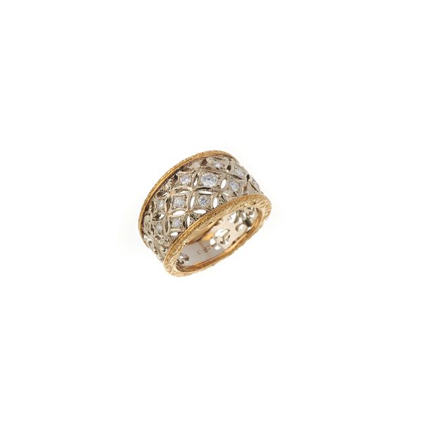 



DIAMOND BAND RING IN 18KT TWO TONE GOLD