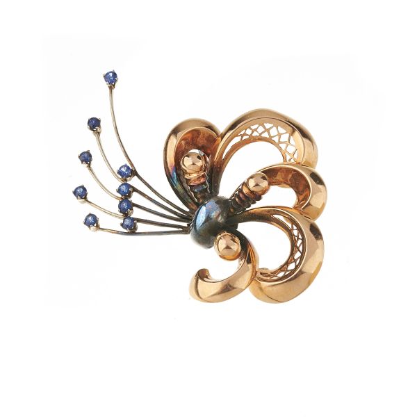 



BRANCH-SHAPED SAPPHIRE BROOCH IN 18KT YELLOW GOLD