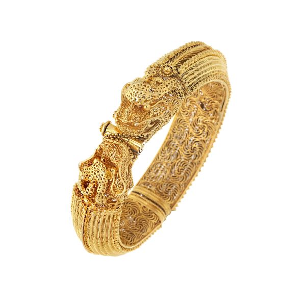 



BANGLE BRACELET IN 21KT GOLD