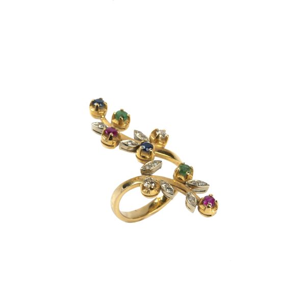 



ANELLO CONTRARIE CON PIETRE DI COLORE E DIAMANTI