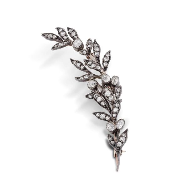 



DIAMOND FLOWERING BRANCH-SHAPED BROOCH IN GOLD AND SILVER 